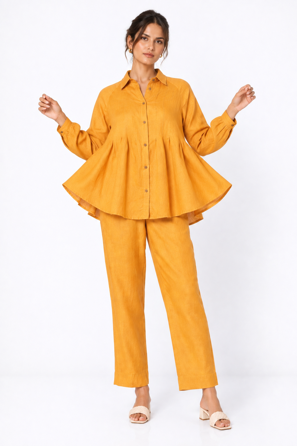Sarson mustard linen shirt set for women showing flared shirt silhouette