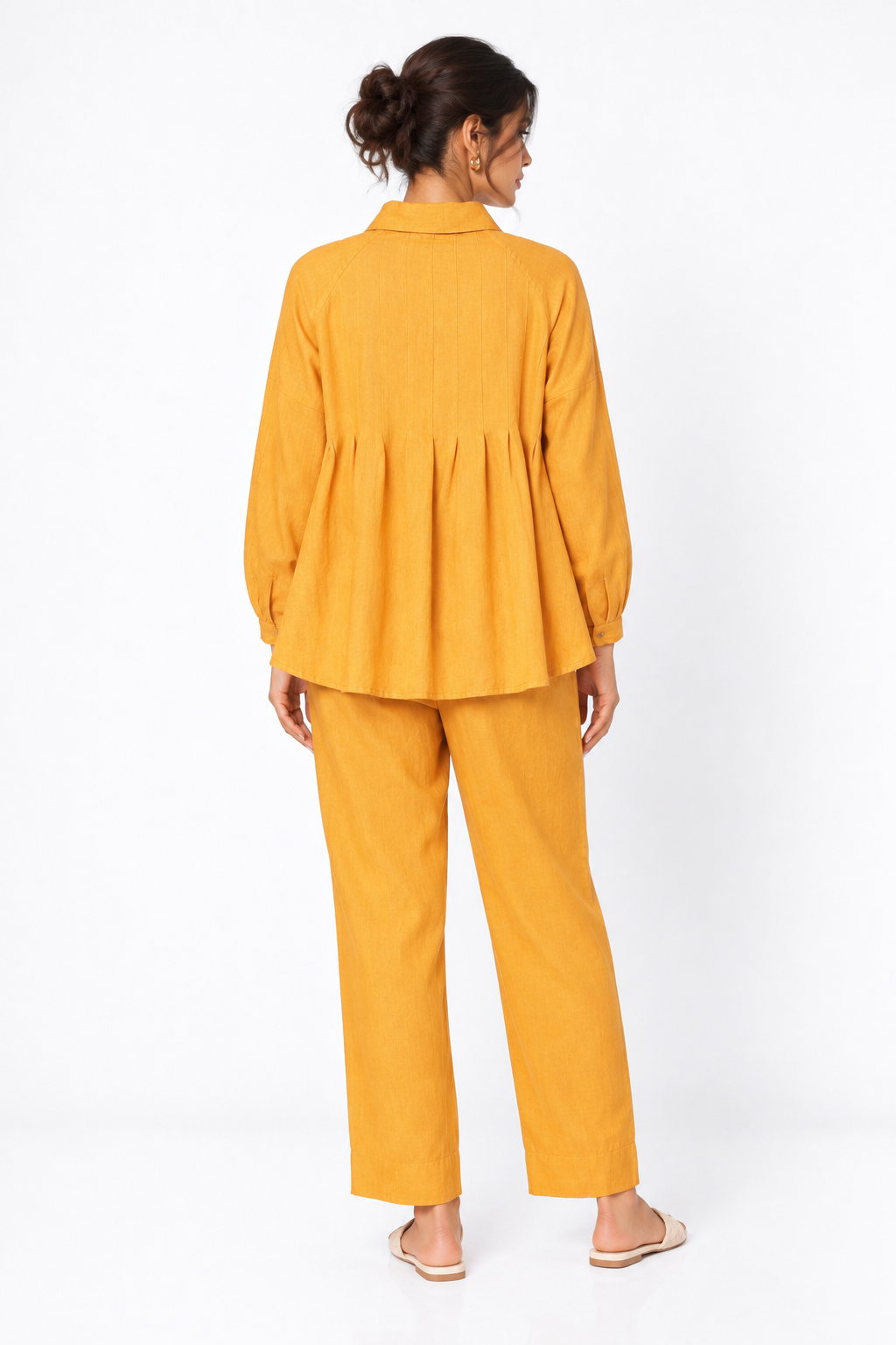 Back view of Sarson linen shirt set for women in mustard