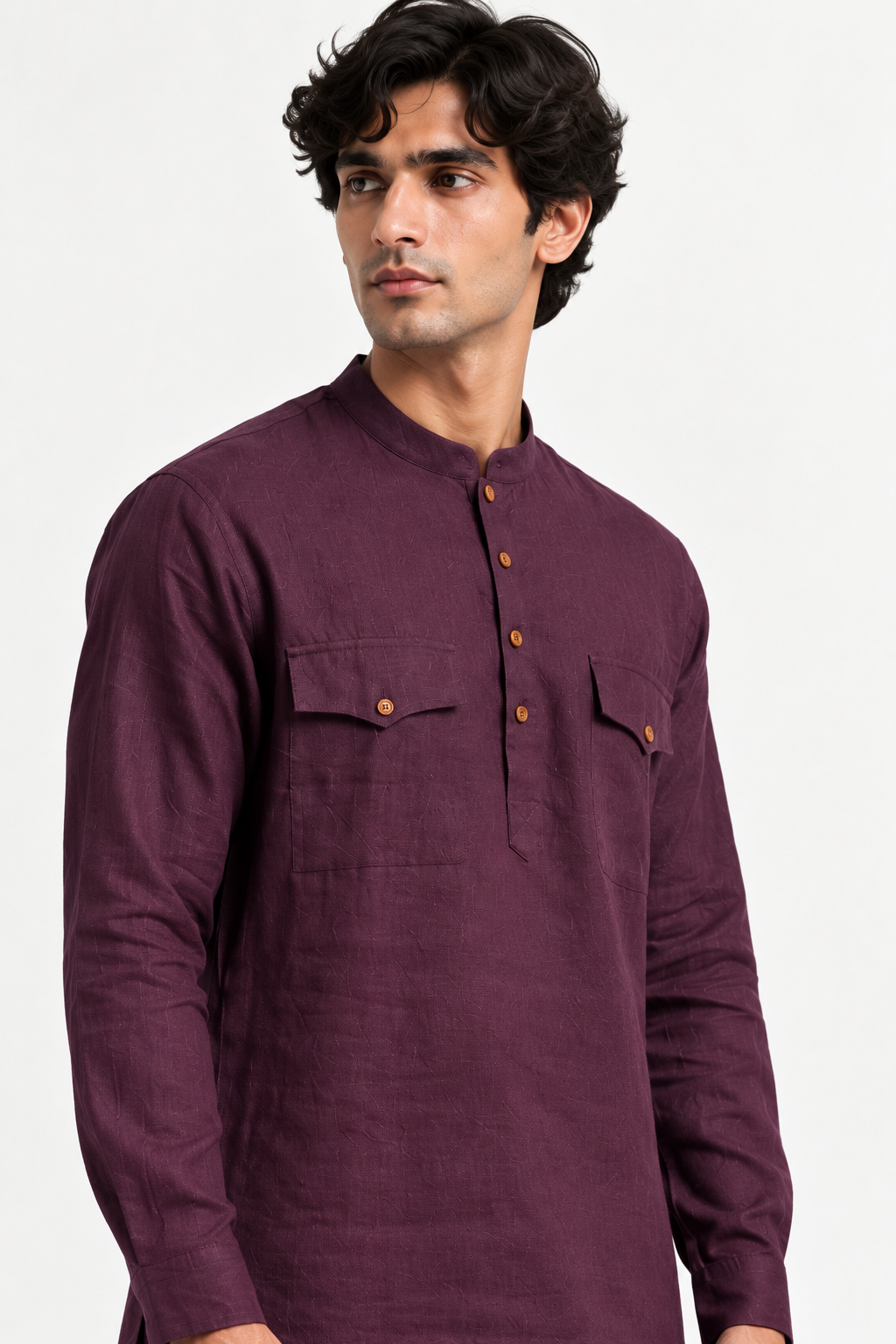 Close-up of the Shaam men's plum kurta featuring a band collar, wooden-tone buttons and flap chest pockets