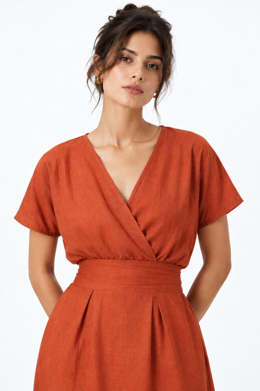 Shahmai terracotta linen dress with V-neck and textured linen fabric