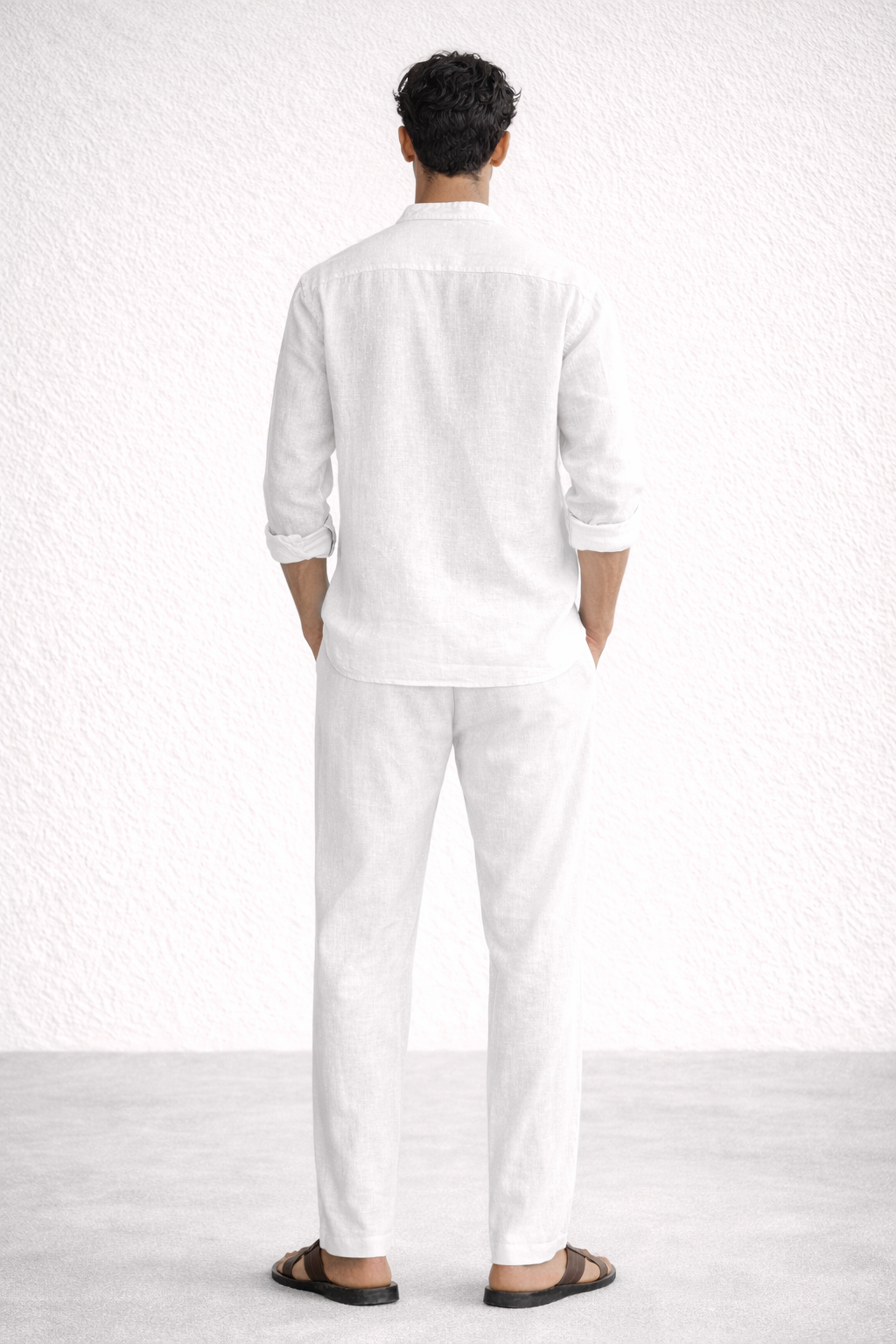 Back view of Taj Safa white linen short kurta set for men