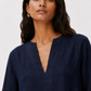 Close-up of Twilight Navy Linen Set highlighting the V-neckline and natural linen texture.