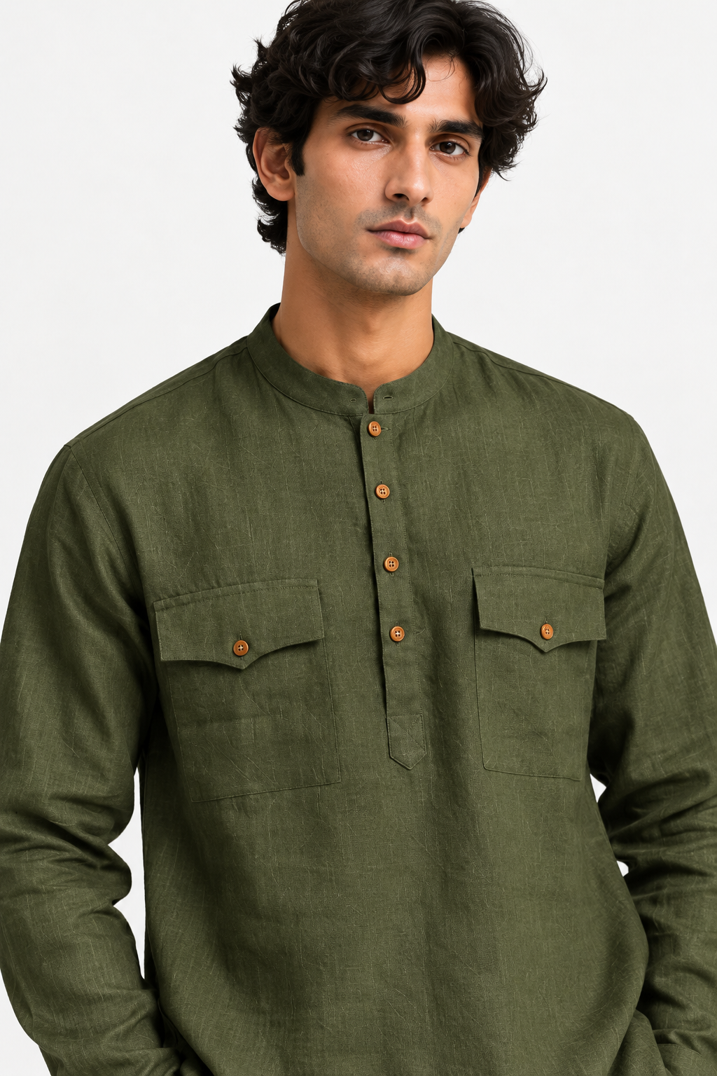 Close-up of the Vann olive-green linen kurta highlighting its mandarin collar, wooden-look buttons, dual flap pockets, and natural fabric texture