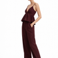 Side view of Vera Wine linen set showing peplum top and relaxed fit pants