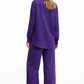 Back view of Violet Muse Linen Set for Women showing wide-leg pants and shirt fall