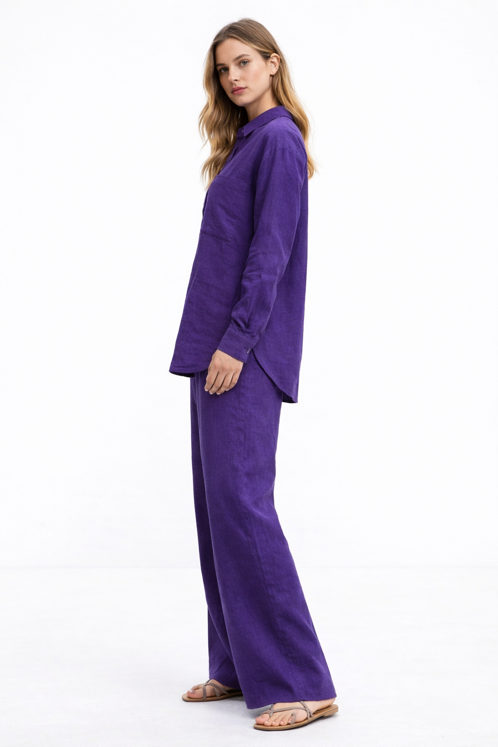 Side angle view of Violet Muse Linen Set highlighting fluid linen drape and relaxed silhouette