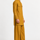 Side view of the Zafran Linen Set for Men showcasing the kurta silhouette, side slits, and flowing trousers.