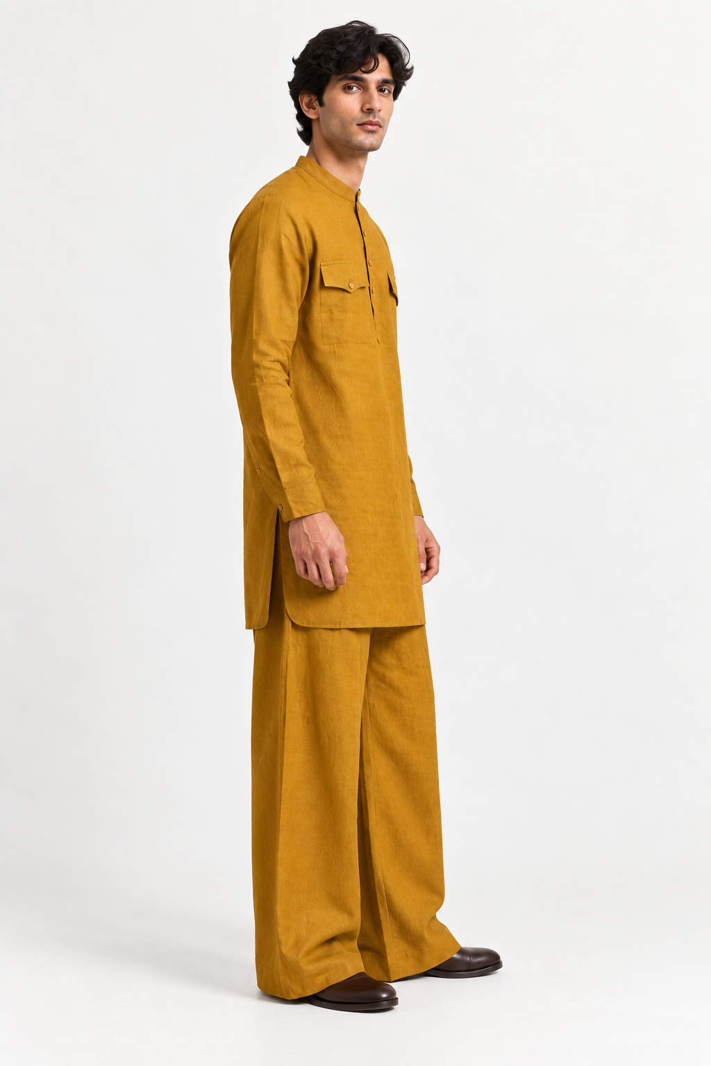 Side view of the Zafran Linen Set for Men showcasing the kurta silhouette, side slits, and flowing trousers.