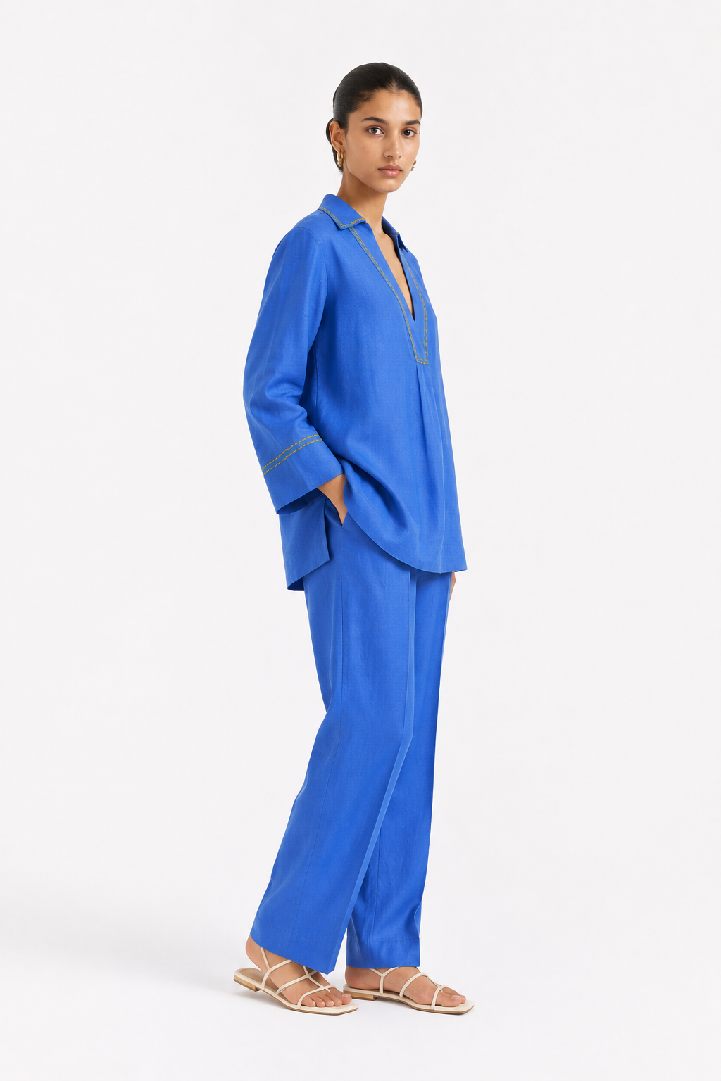 Side view of Ziya linen set for women in cobalt blue with lemon yellow detailing